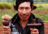 Frank Weaver, Guarani shaman holding cross and rattle, 2006