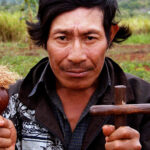 Frank Weaver, Guarani shaman holding cross and rattle, 2006